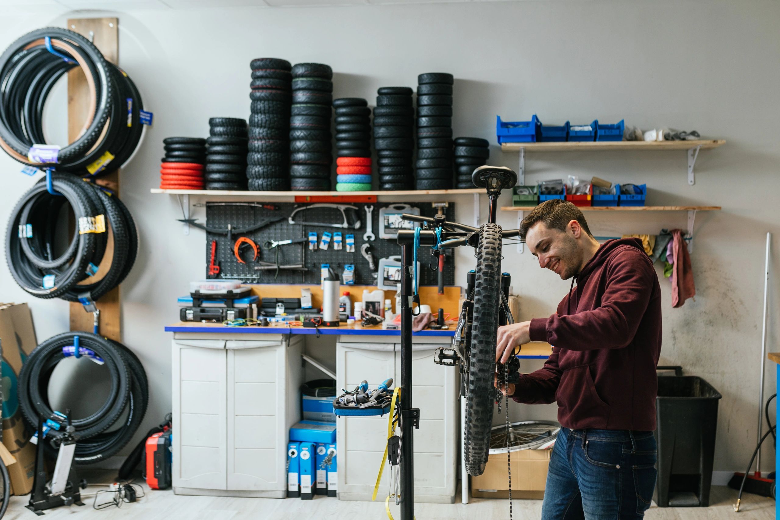Technician servicing a motorcycle drivetrain